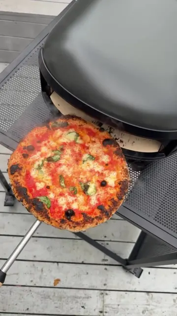Cover frame of a Margherita pizza baked in Gozney's Arc Lite