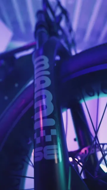 Cover frame of Super73's Z Miami special edition video: a close-up of the bike's fork lettering under purple light