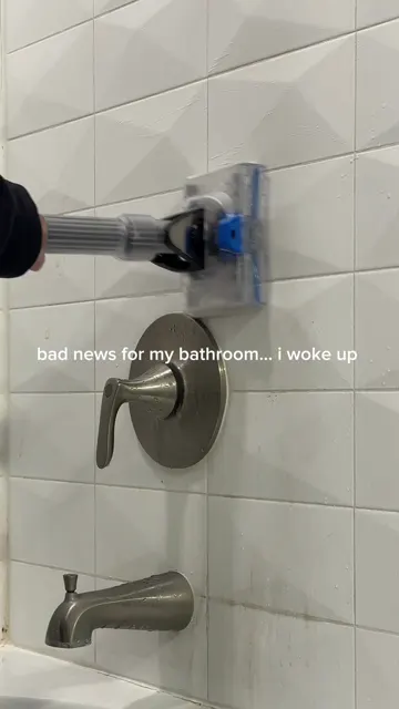 Cover frame of Shark's video of a cordless floor cleaner scrubbing a tiled shower wall, its most-viewed of the last 35 posts