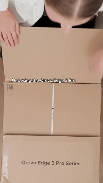Cover frame of Roborock's unboxing video for the Qrevo Edge 3 Pro robot vacuum, a box opened from above