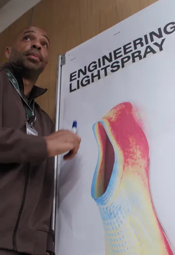 On's LightSpray video: a man sketches the shoe on a board. On's most-viewed post of its last 20.