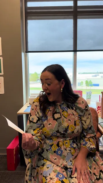 A Simple Modern team member reacting to a note in the office, Simple Modern's most-viewed recent post.